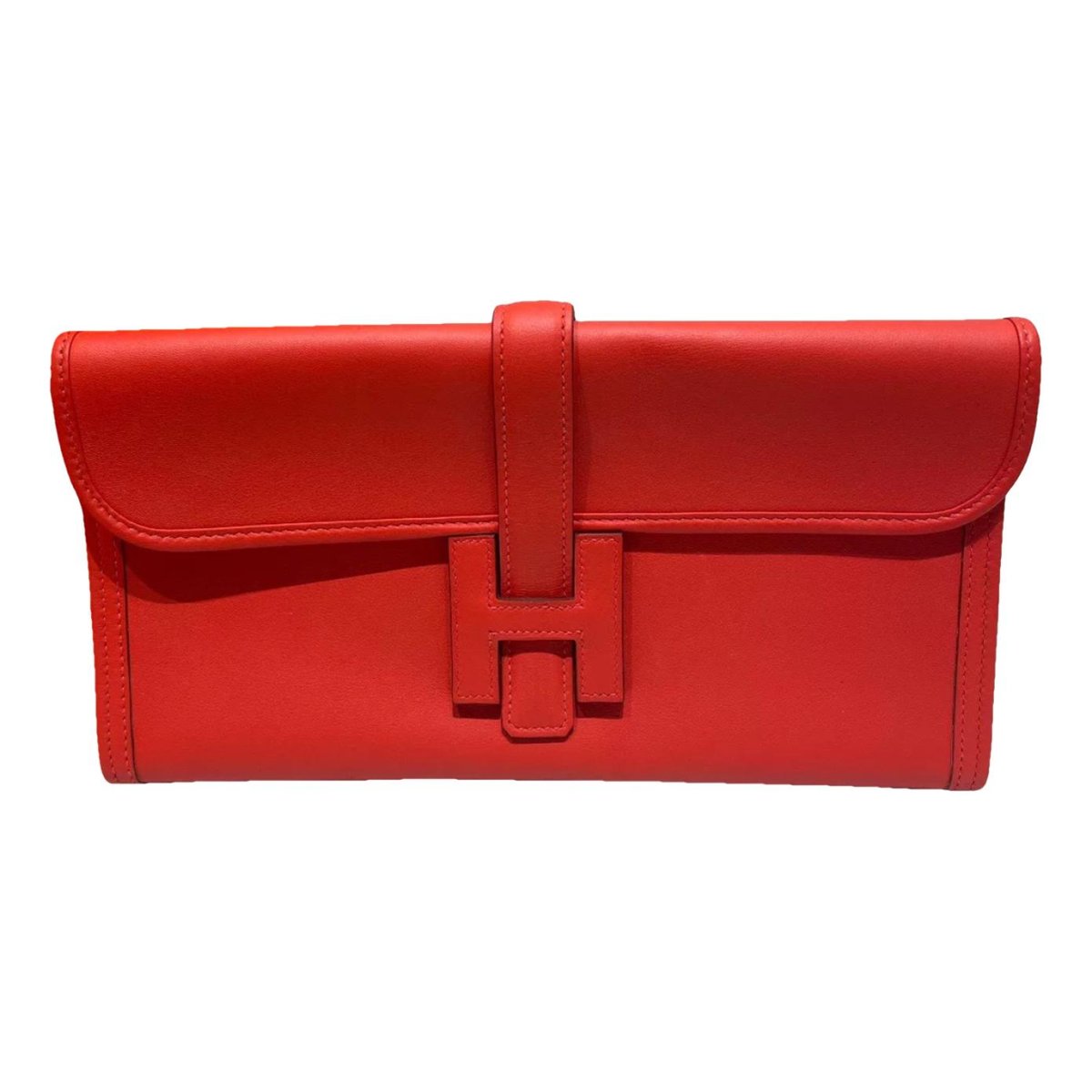 Jige leather clutch bag