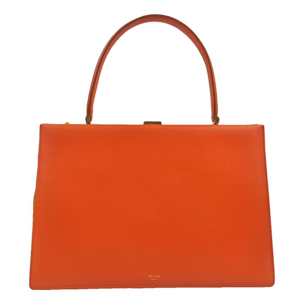 Clasp leather handbag