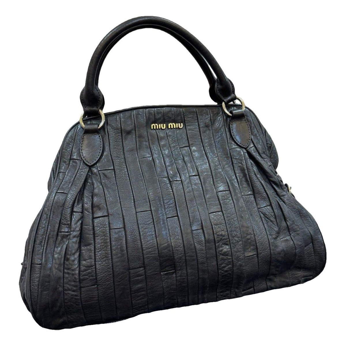 Matelassé leather handbag