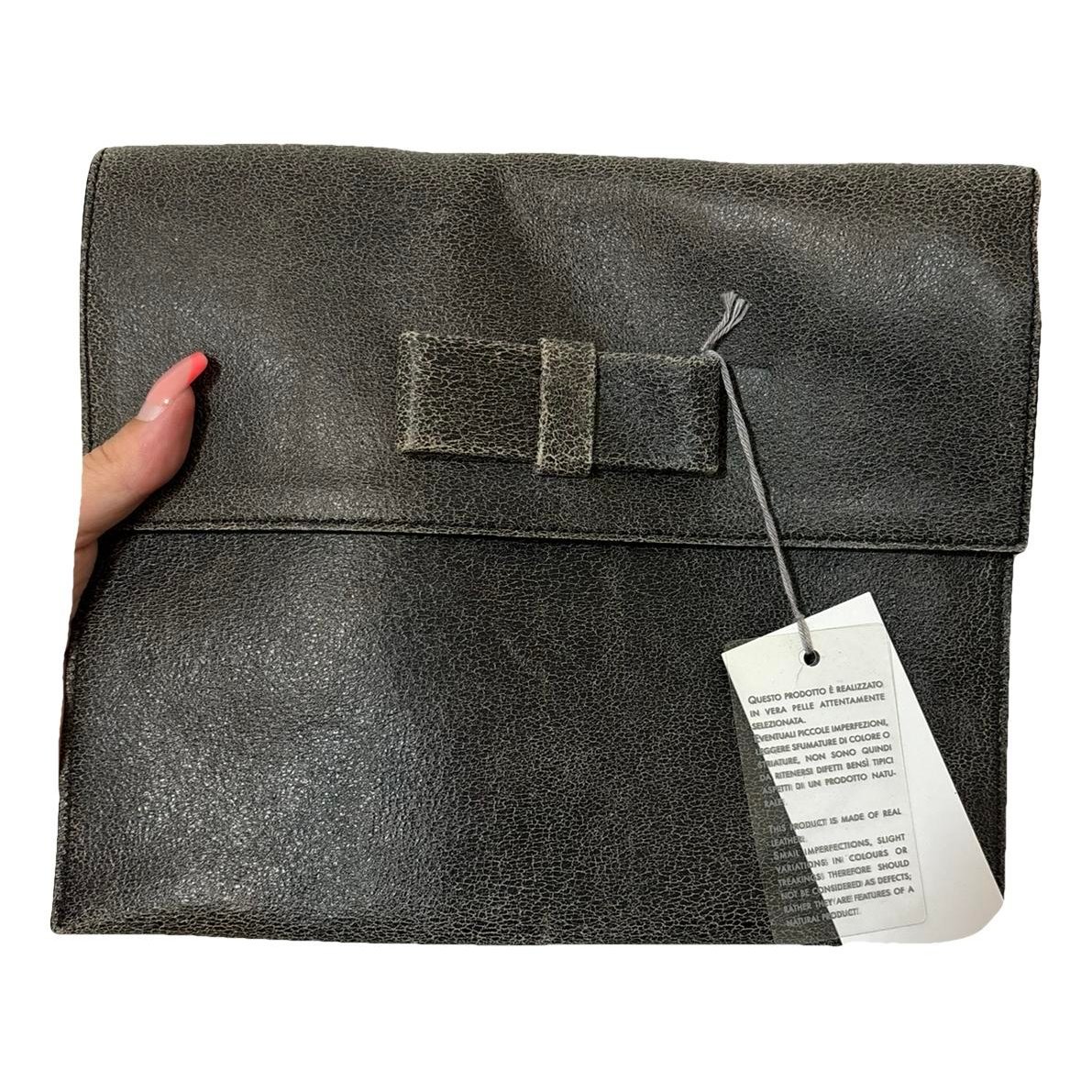 Exotic leathers clutch bag