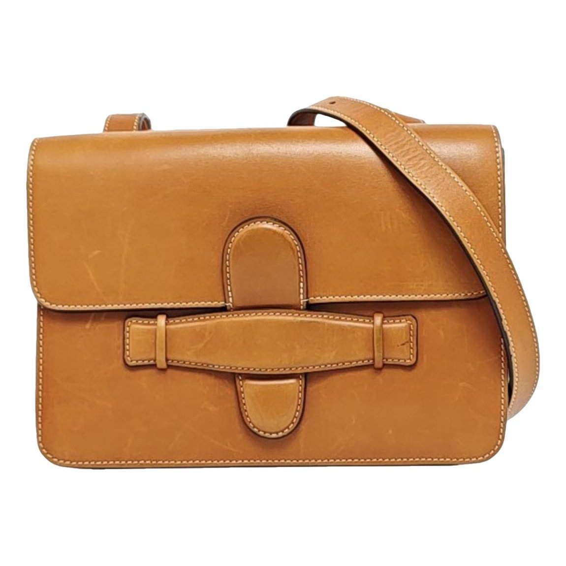 Symmetrical leather handbag