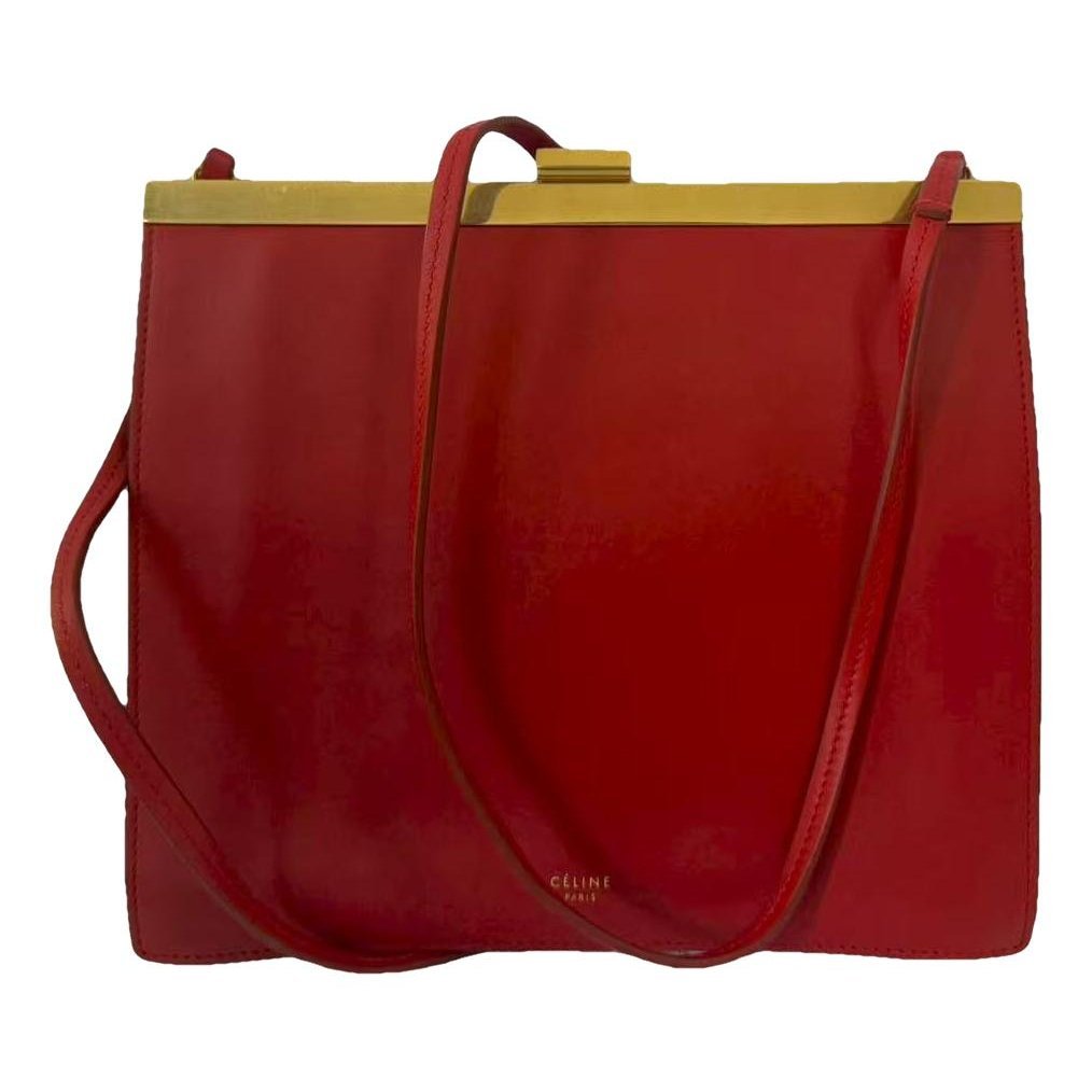 Clasp leather handbag