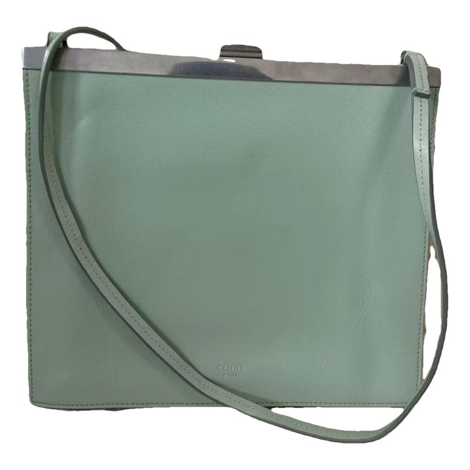 Clasp leather handbag