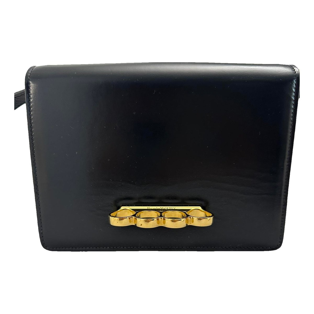 Knuckle leather clutch bag