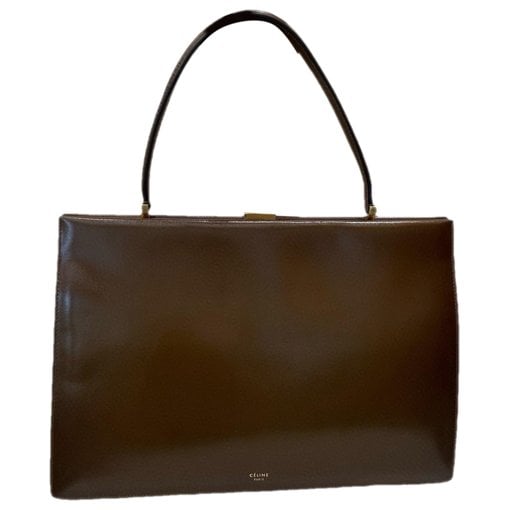 Clasp leather handbag