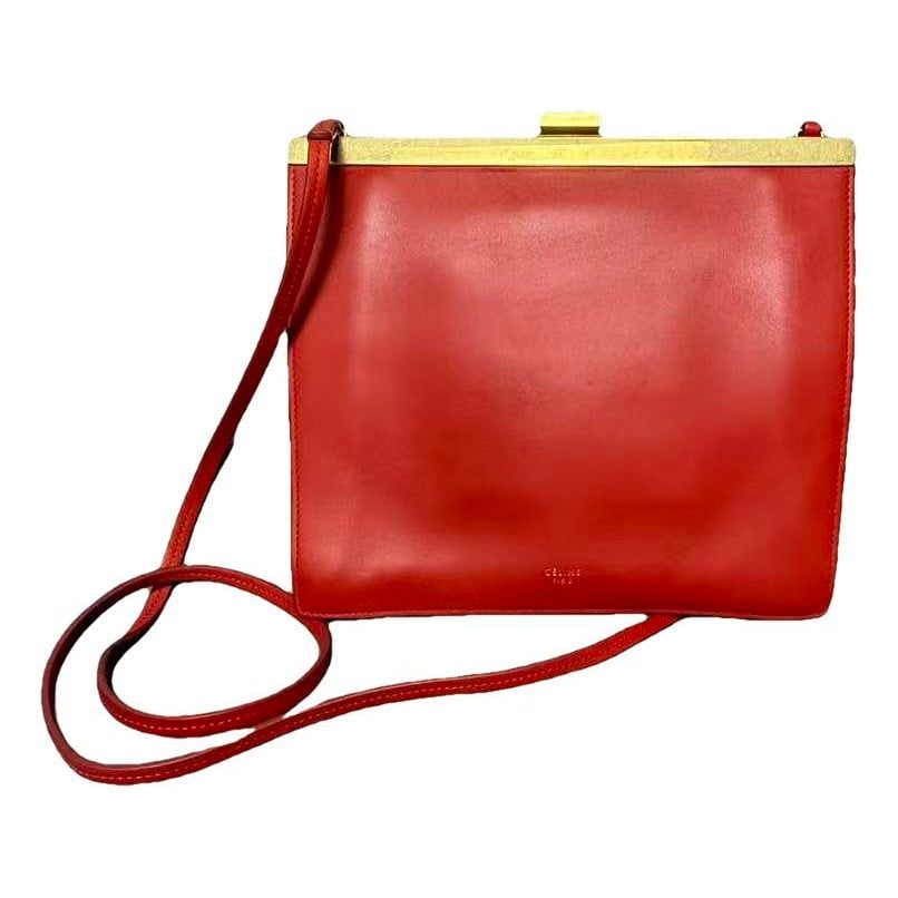 Clasp leather handbag