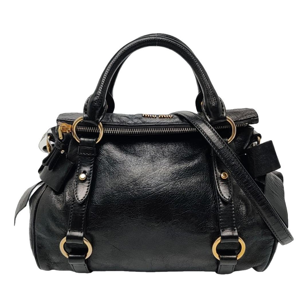 Bow bag leather handbag