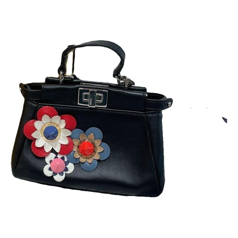 Peekaboo mini pocket leather handbag