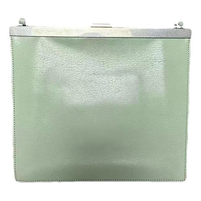 Clasp leather handbag