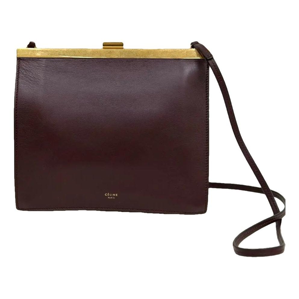 Clasp leather handbag