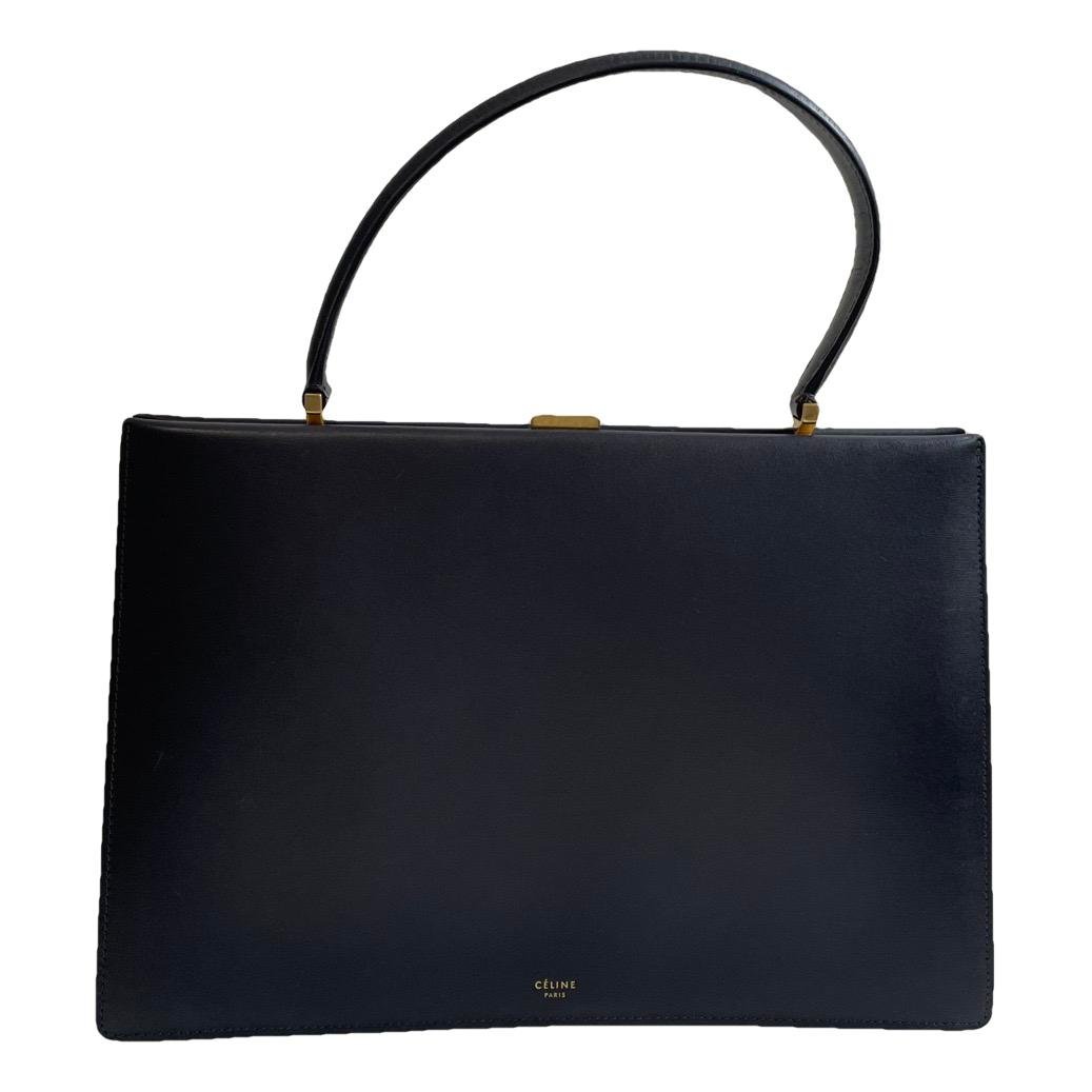 Clasp leather handbag
