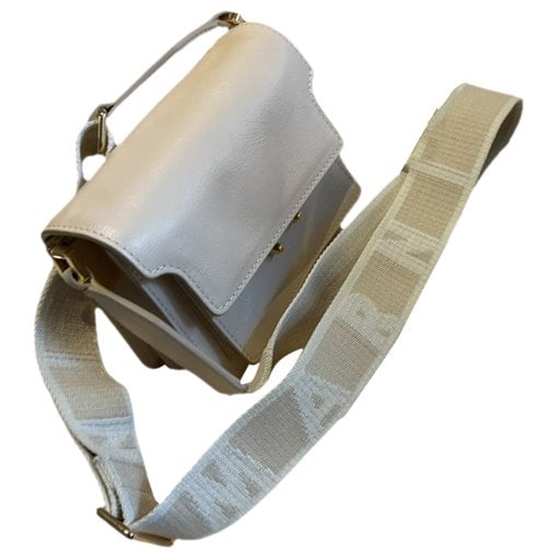 Trunk leather crossbody bag