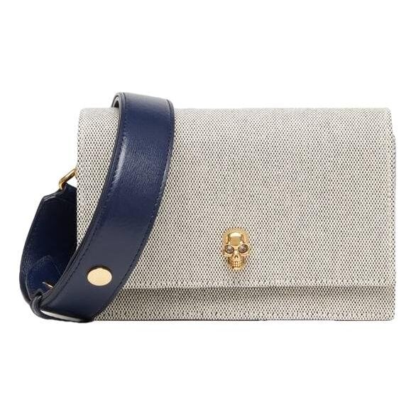 Skull patent leather handbag