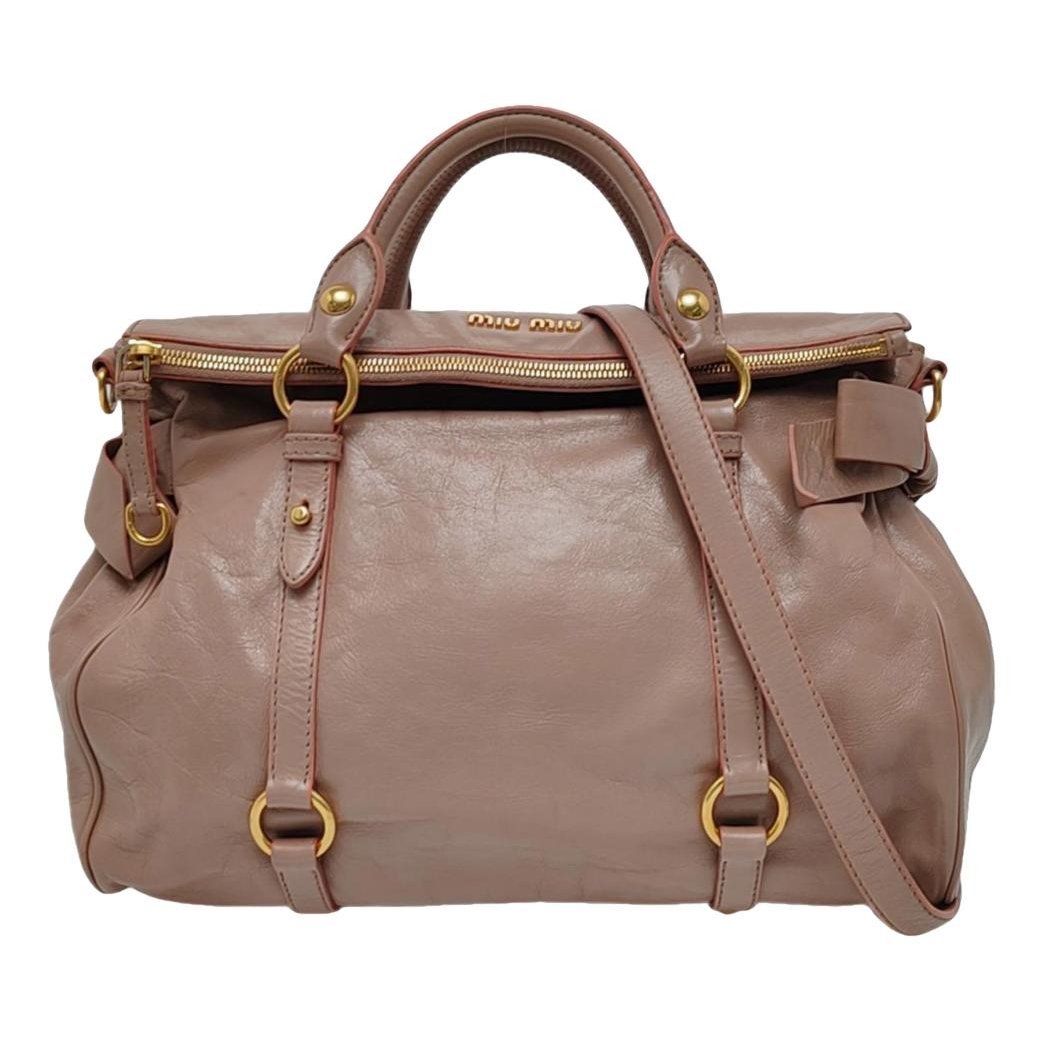 Bow bag leather handbag