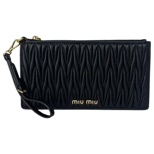 Matelassé leather clutch bag