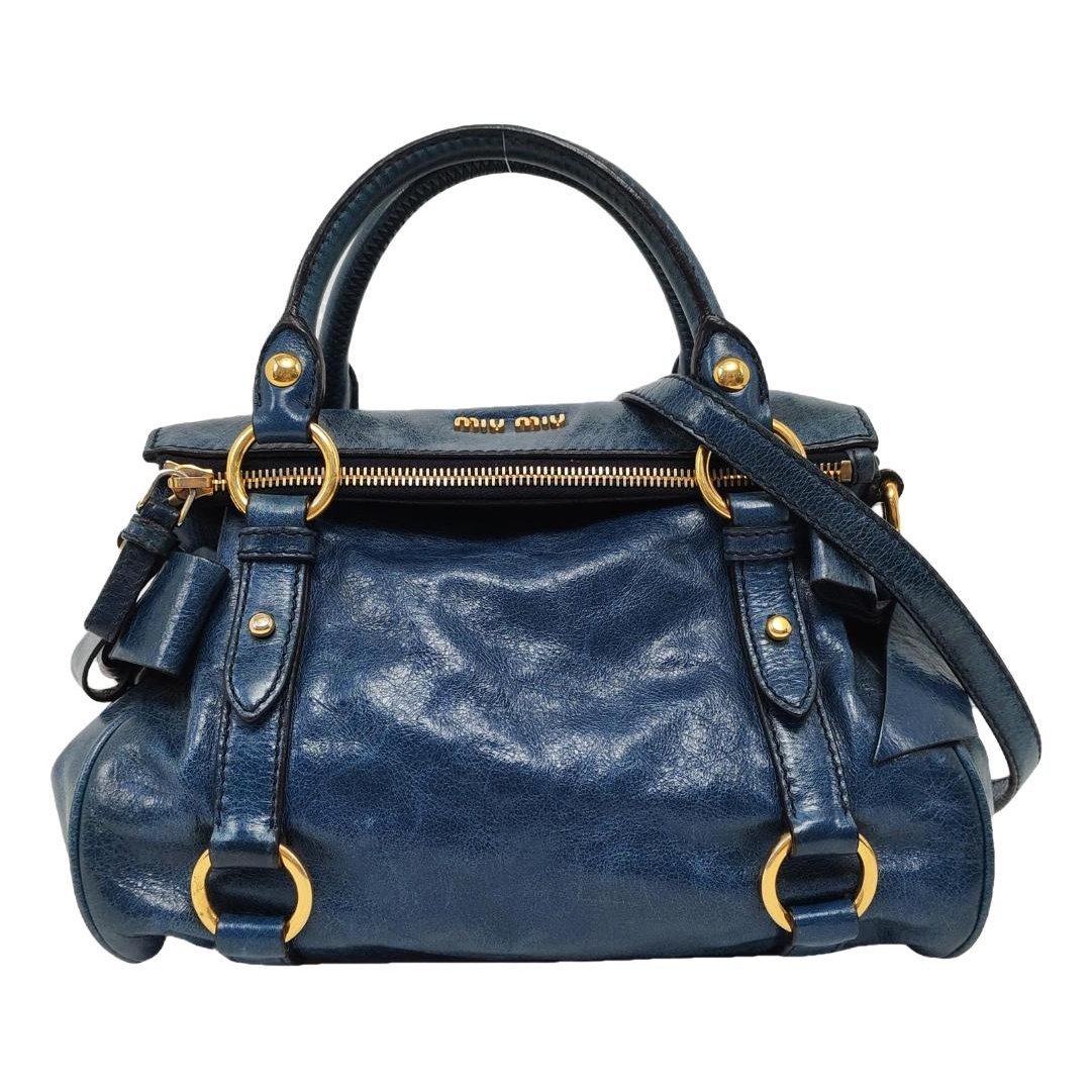 Bow bag leather handbag