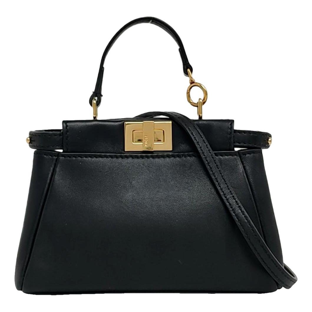 Peekaboo mini pocket leather crossbody bag