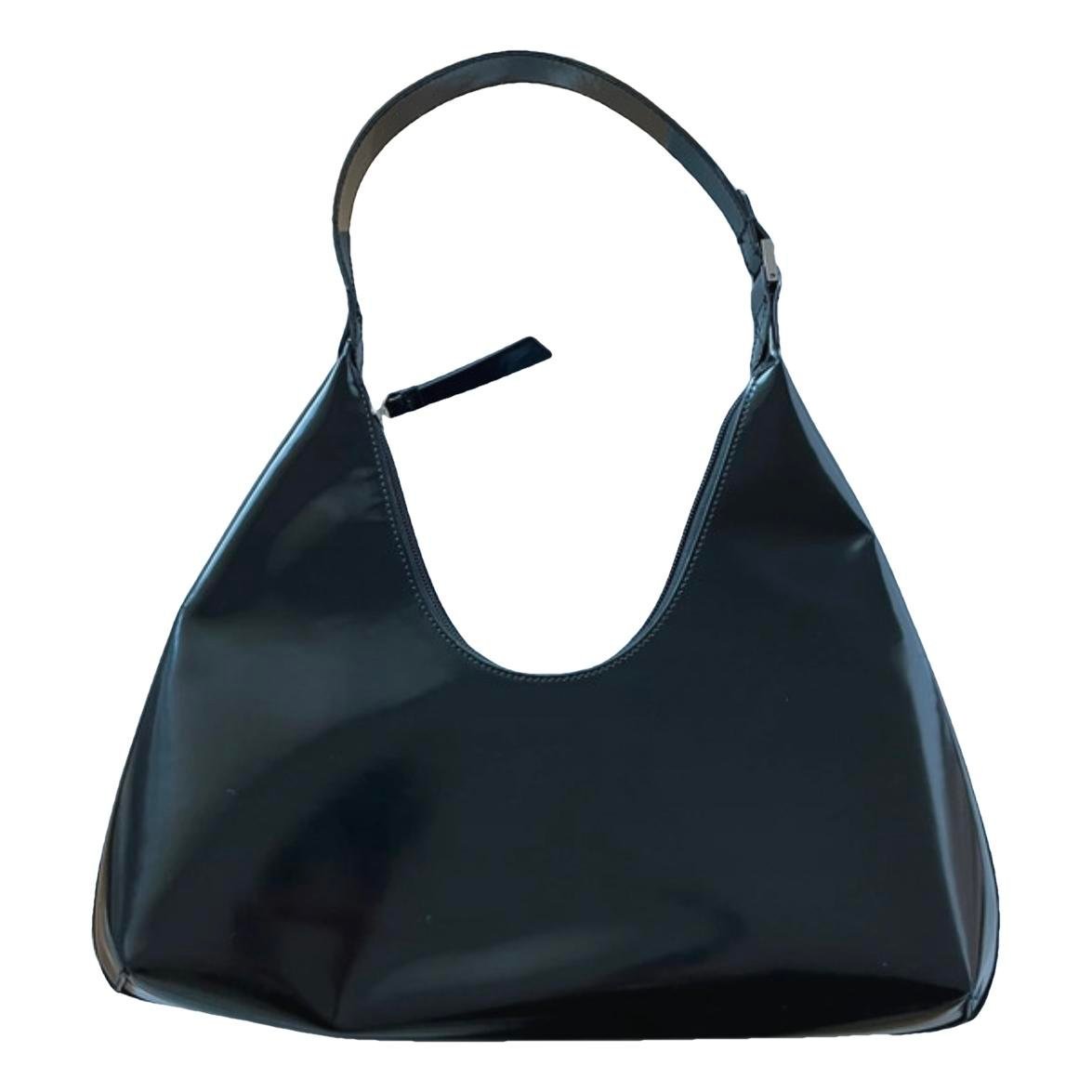 Amber patent leather handbag