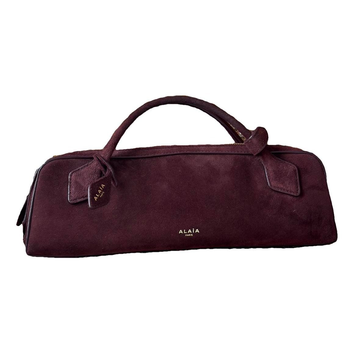 Le Teckel Clutch handbag