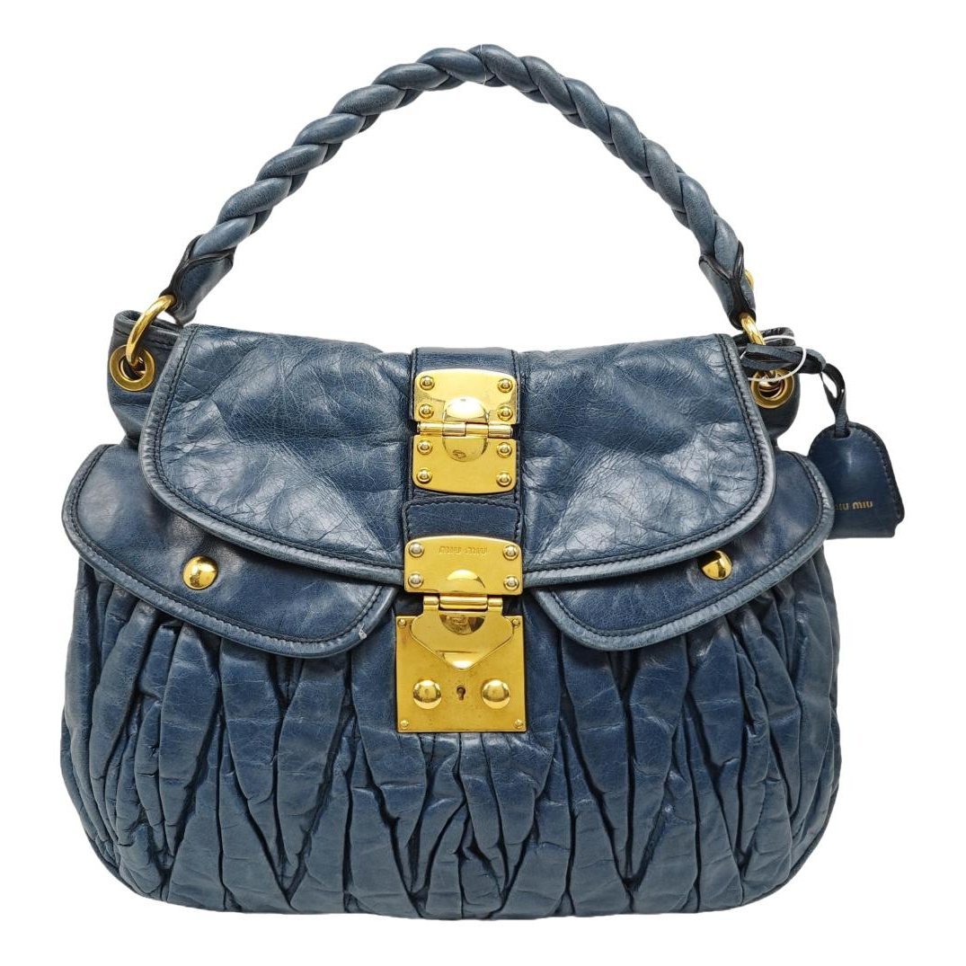 Coffer leather handbag
