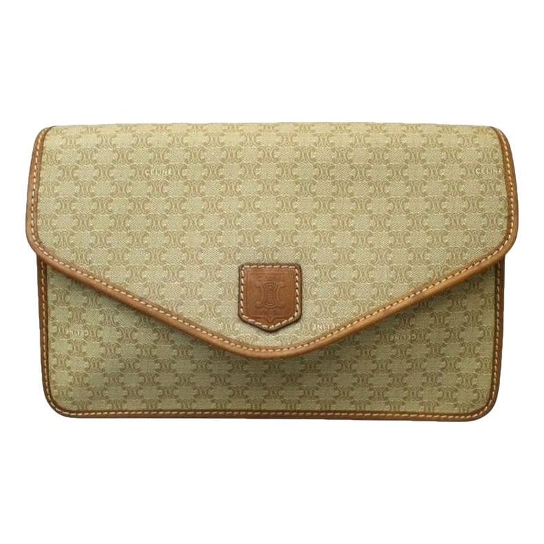 Triomphe Vintage cloth clutch bag