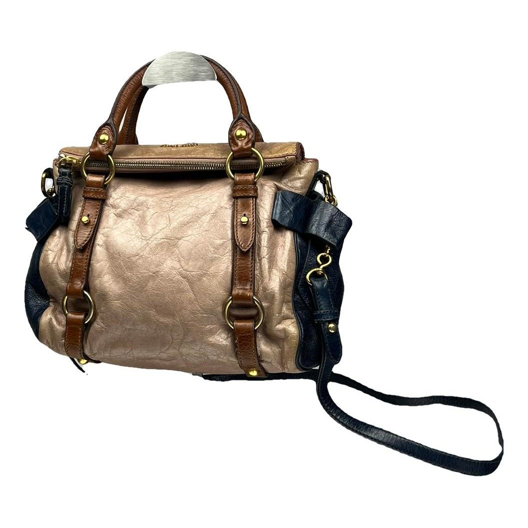 Bow bag leather handbag