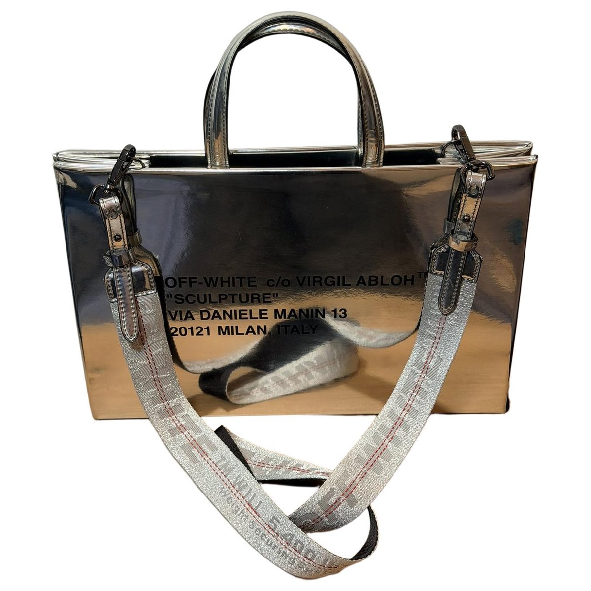 Sculpture patent leather handbag