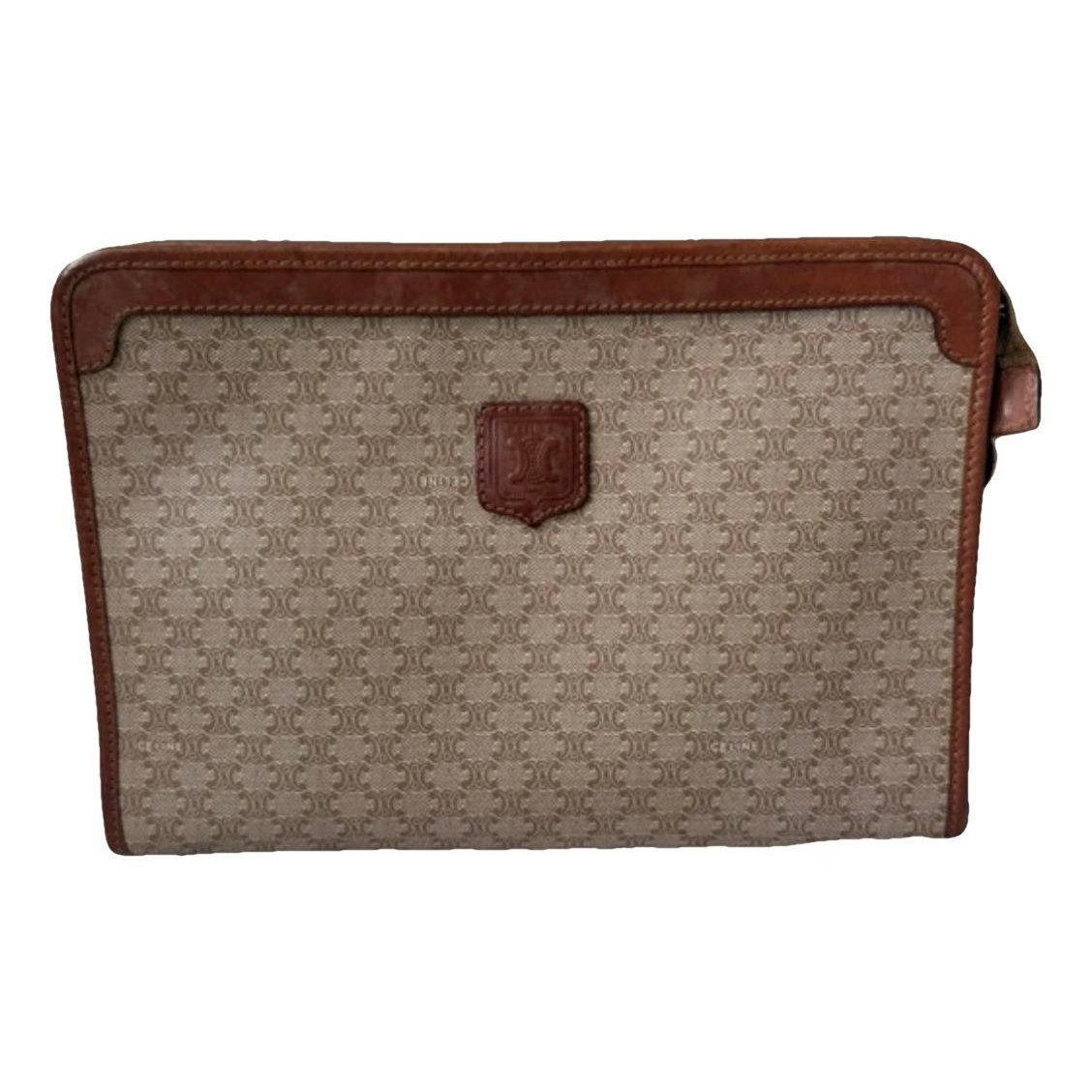 Triomphe Vintage leather clutch bag