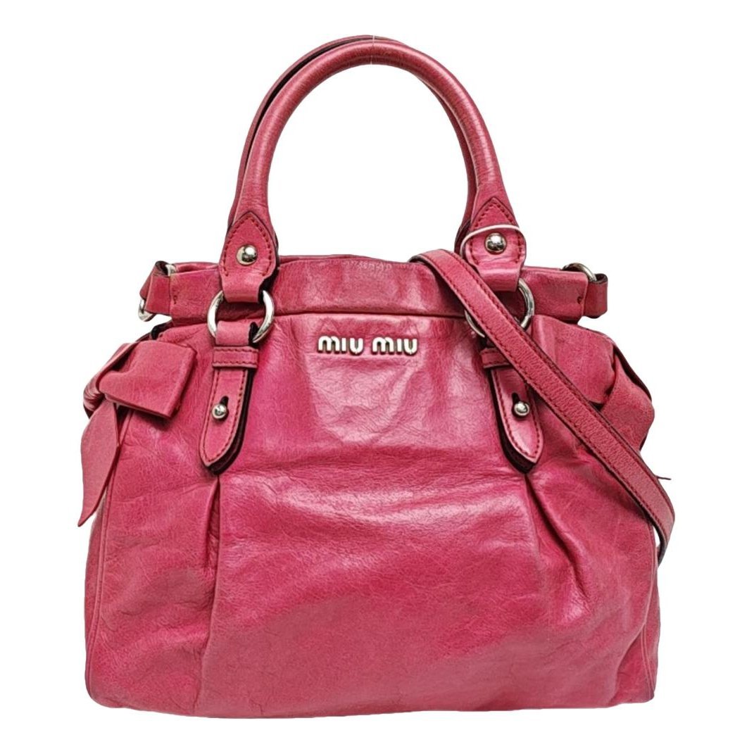 Bow bag leather handbag