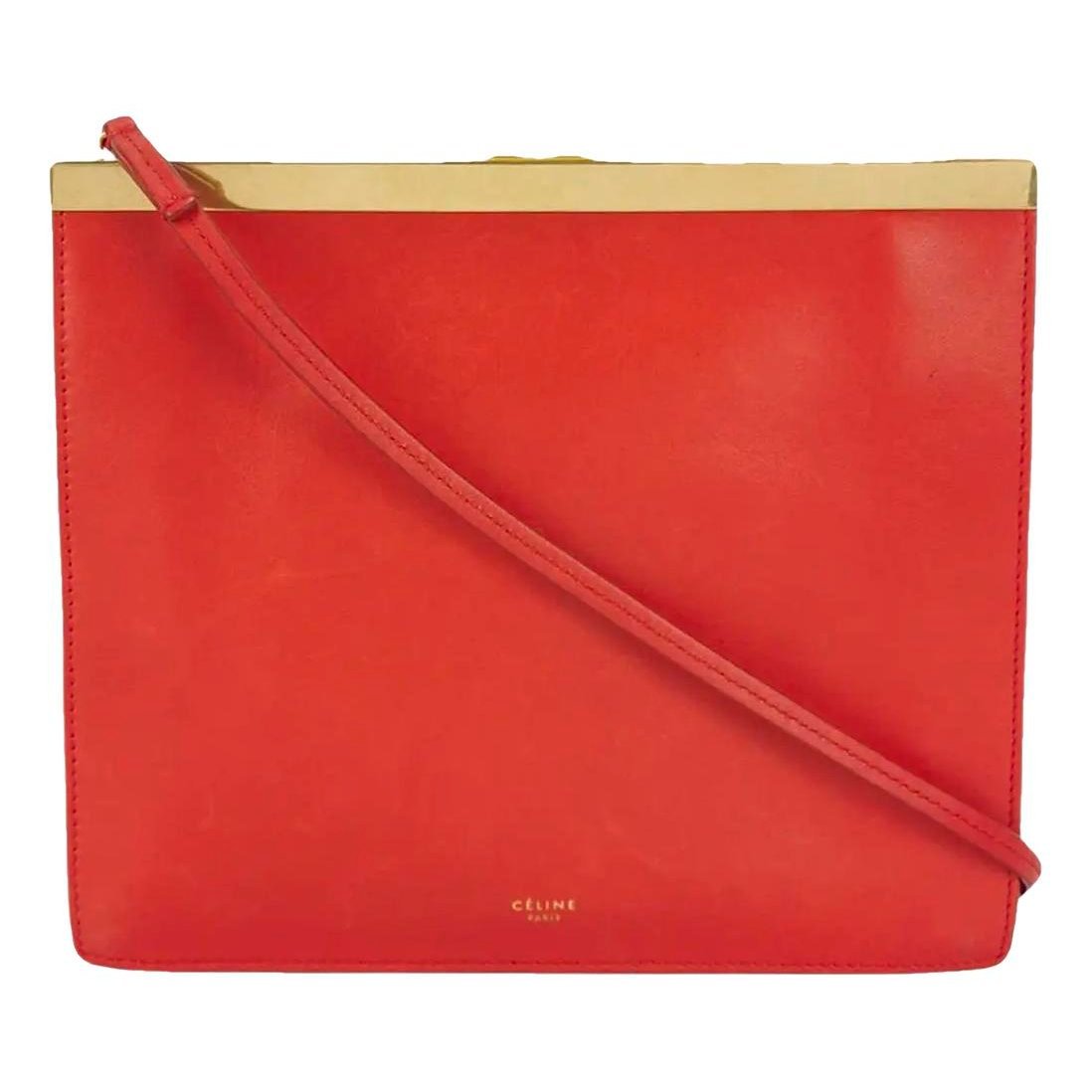 Clasp leather handbag
