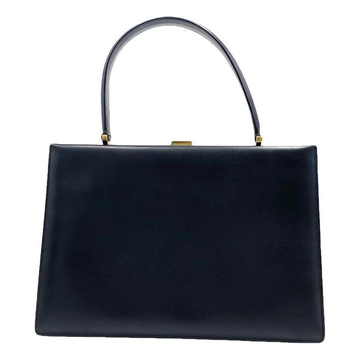 Clasp leather handbag