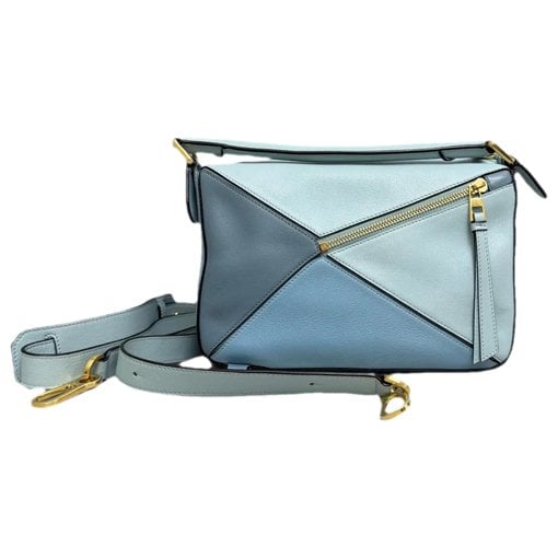 Puzzle leather handbag