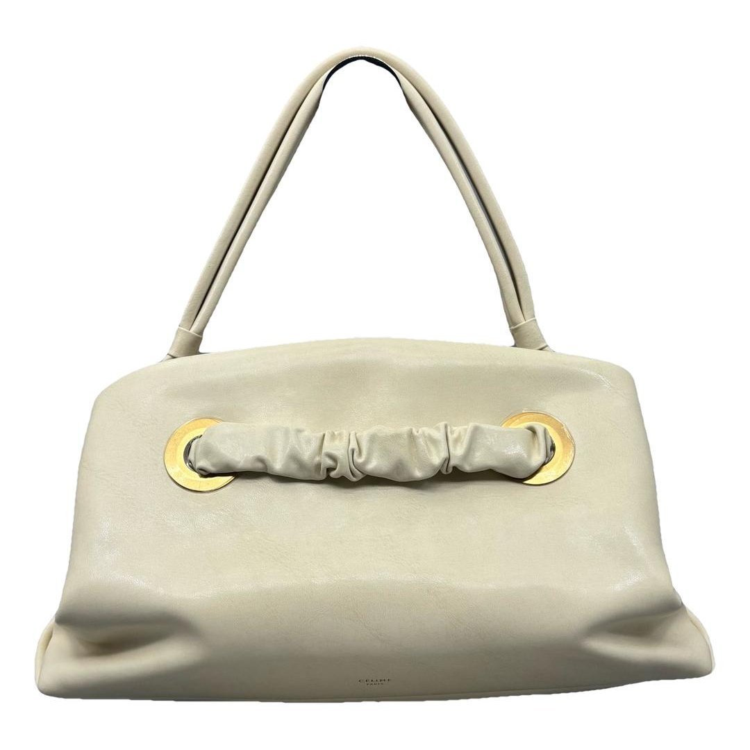 Eyelet leather handbag