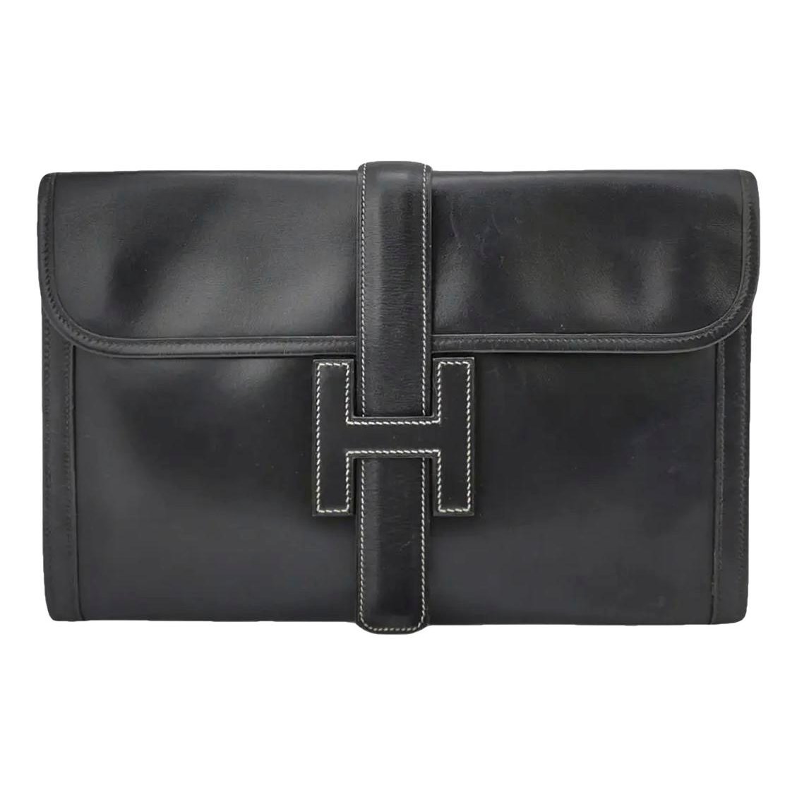 Jige leather clutch bag