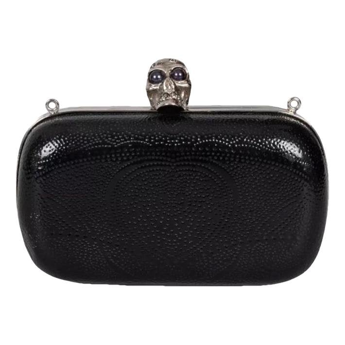 Skull leather clutch bag