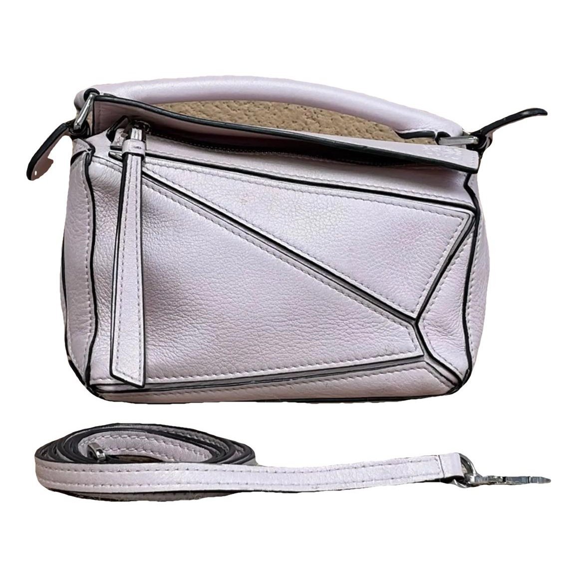 Puzzle leather handbag