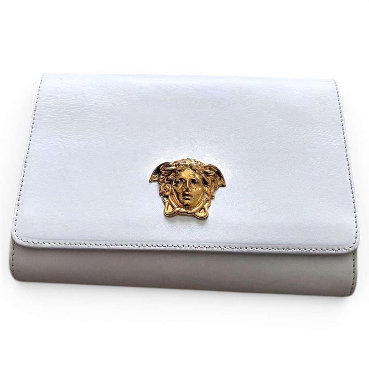 La Medusa leather clutch bag