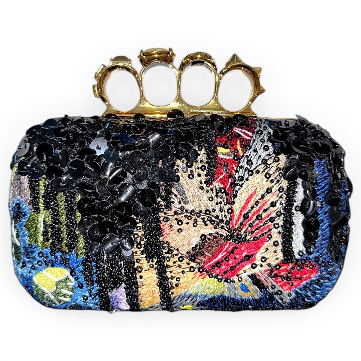 Knuckle leather clutch bag