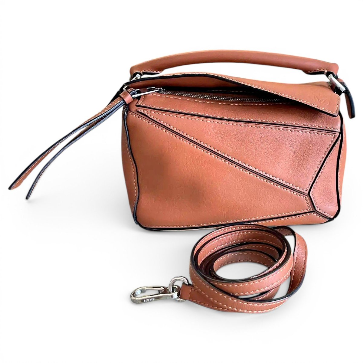 Puzzle leather crossbody bag