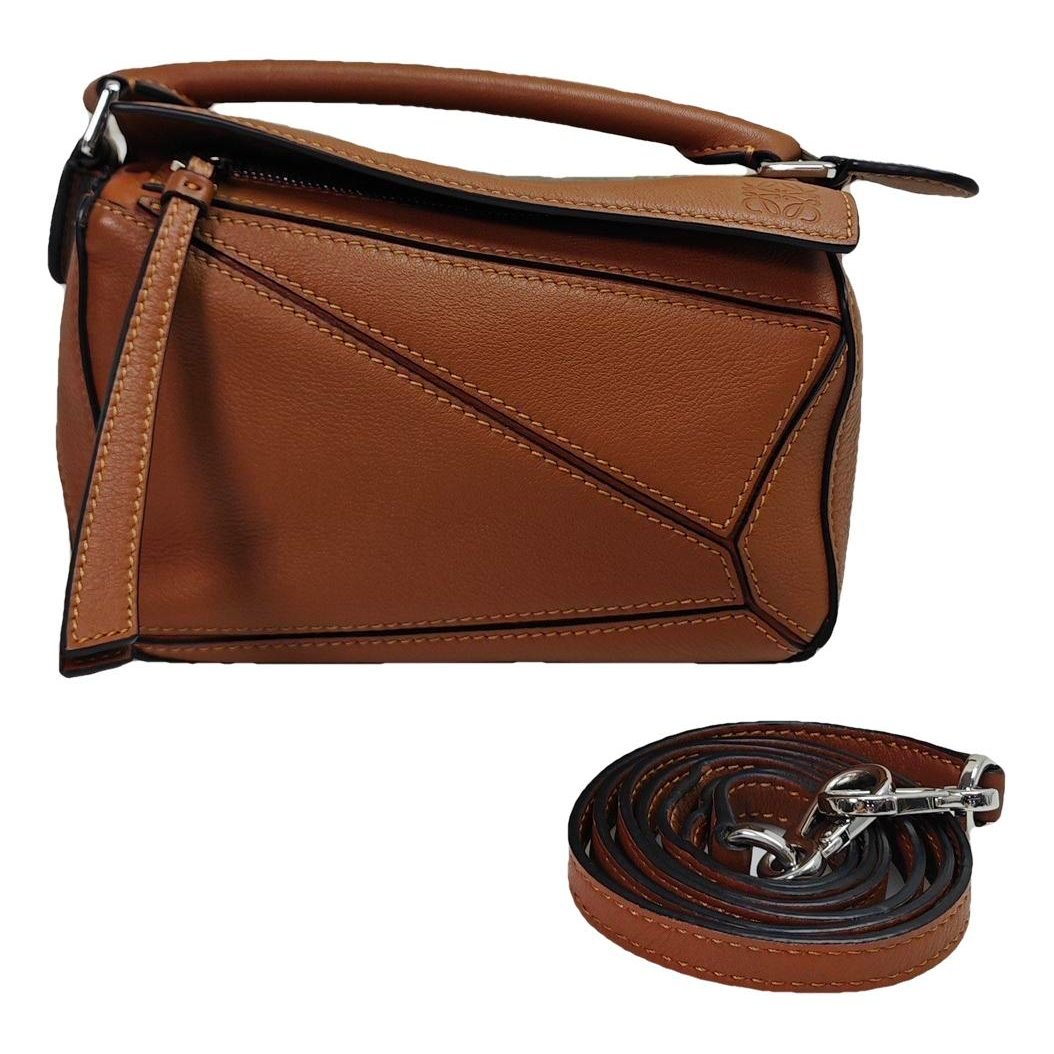 Puzzle leather handbag