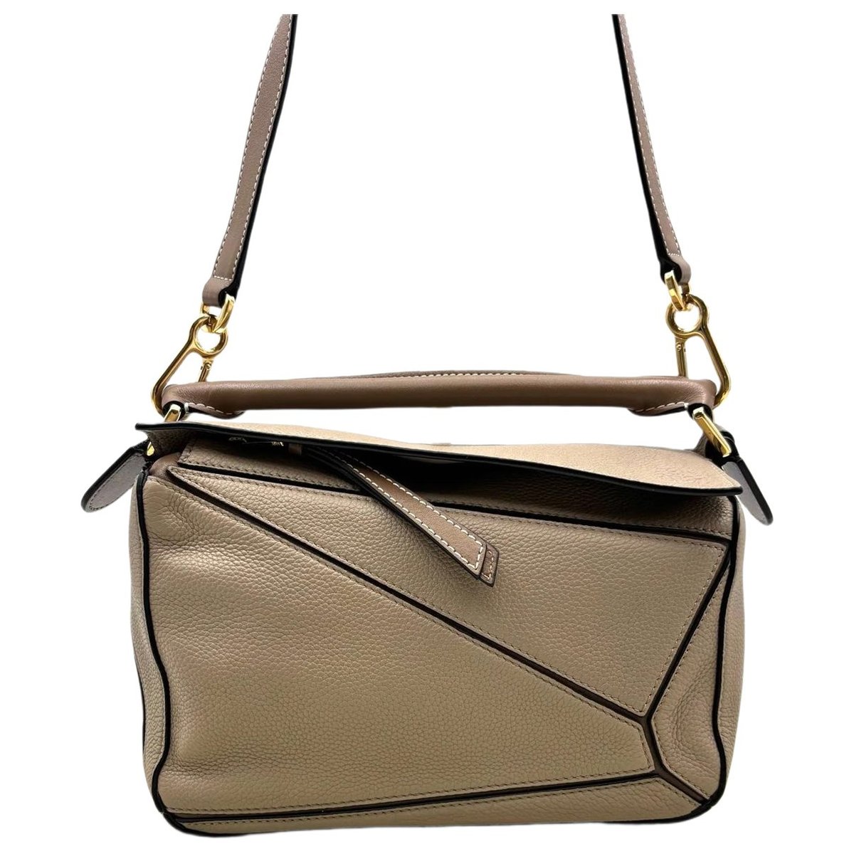 Puzzle leather handbag