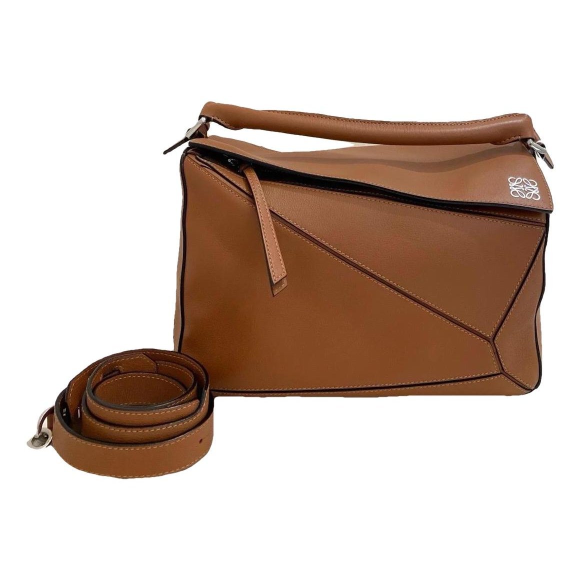 Puzzle leather handbag