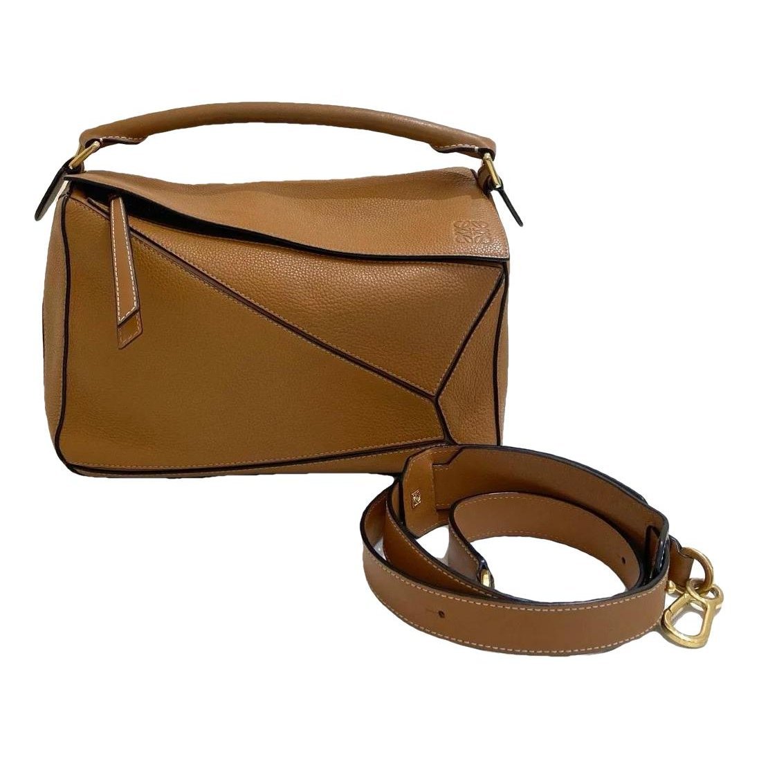 Puzzle leather handbag