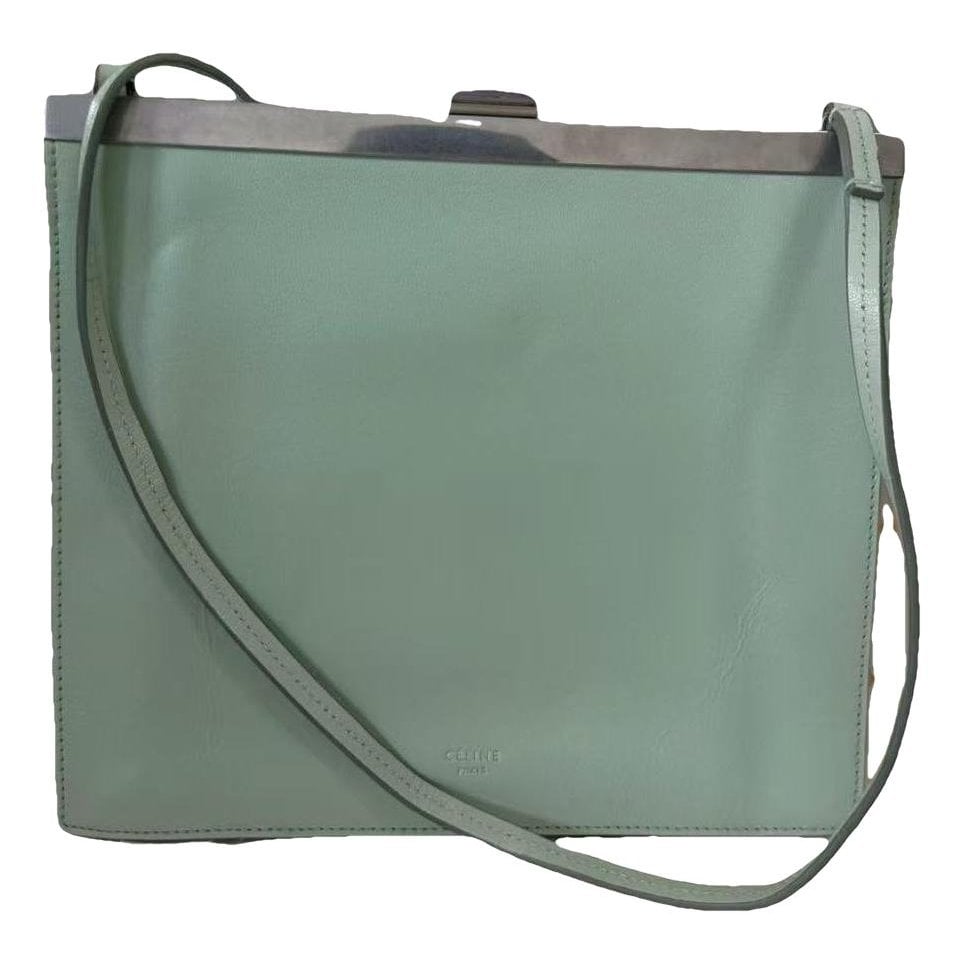 Clasp leather handbag