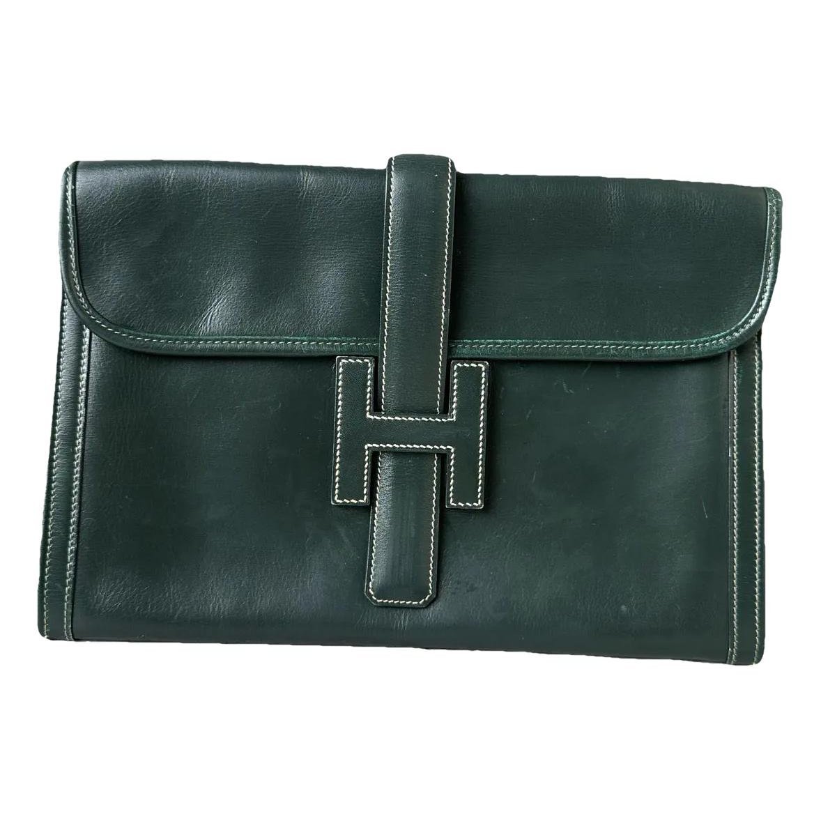 Jige leather clutch bag