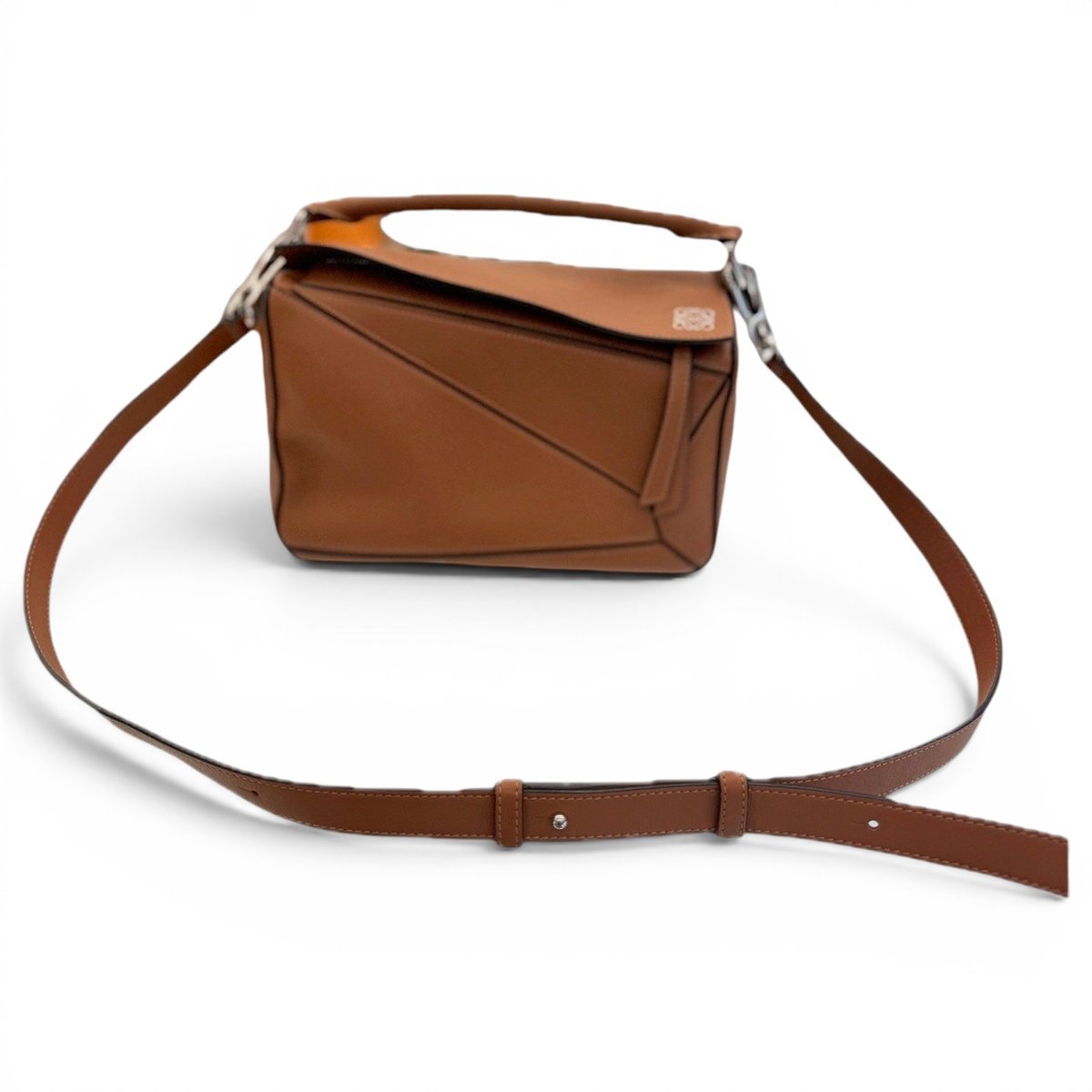 Puzzle leather handbag