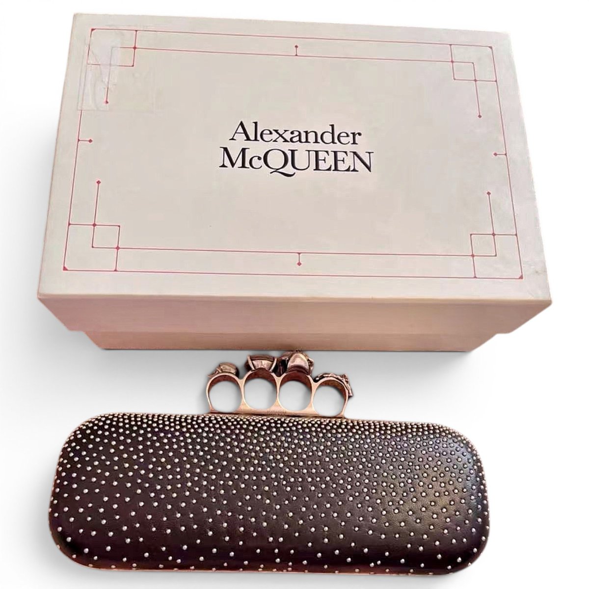 Knuckle clutch bag
