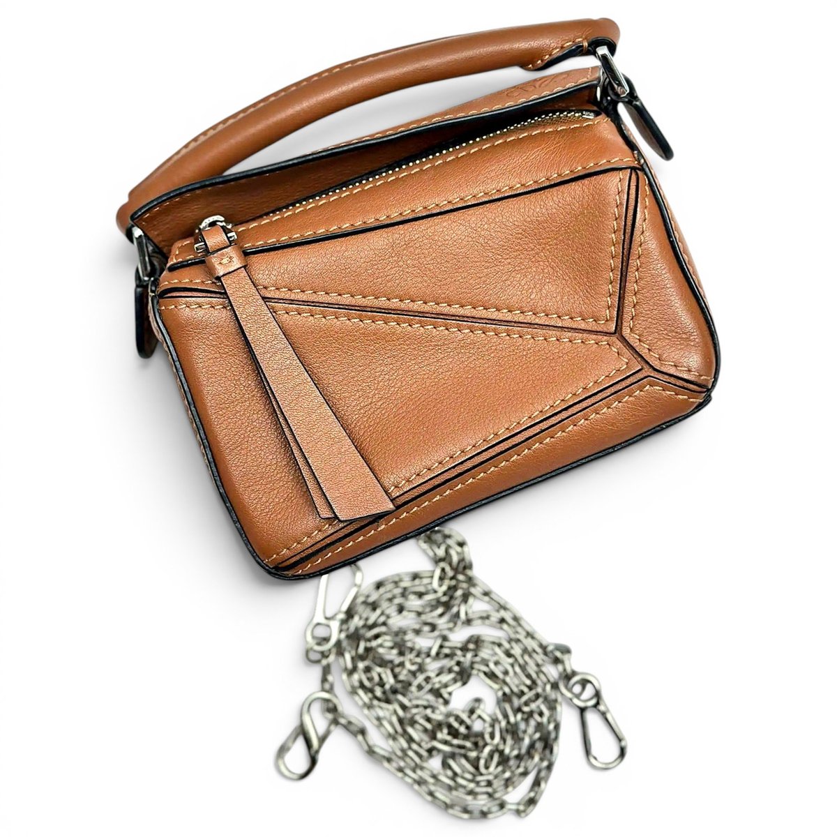 Puzzle leather handbag