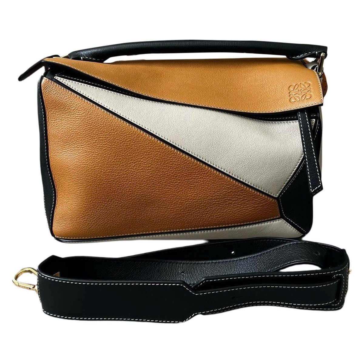 Puzzle leather handbag