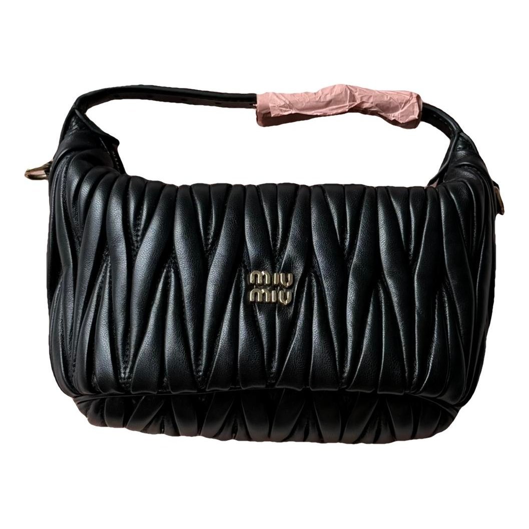 Matelassé leather handbag